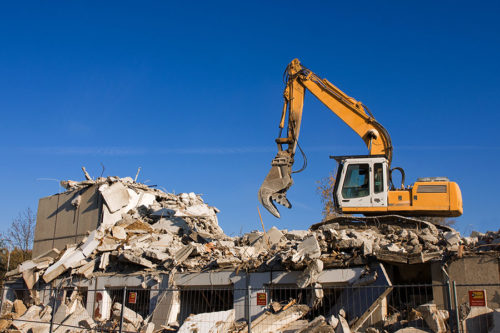 excavator-on-top-of-house-walls-des-moines-ia